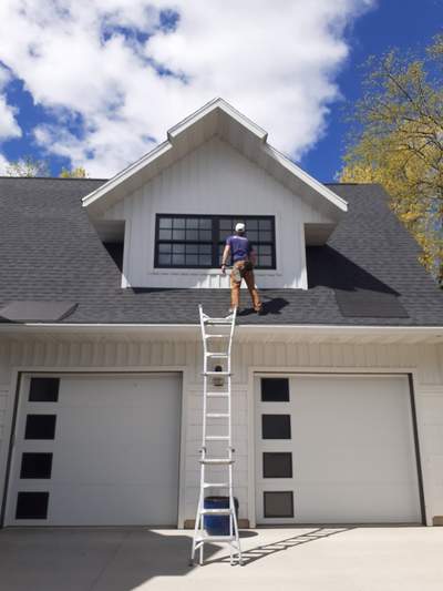 Ladder work on second-story gable windows